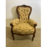 An upholstered open arm button back chair. W:75cm x D:80cm x H:103cm