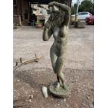 A Garden statue of a female bather. (A.f) H:120cm