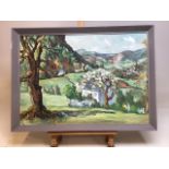 An oil on board Post war landscape depicting a cottage with trees and hills in the background signed