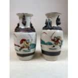 A small pair of Japanese crackle vases decorated with Samurai warriors. With character marks to