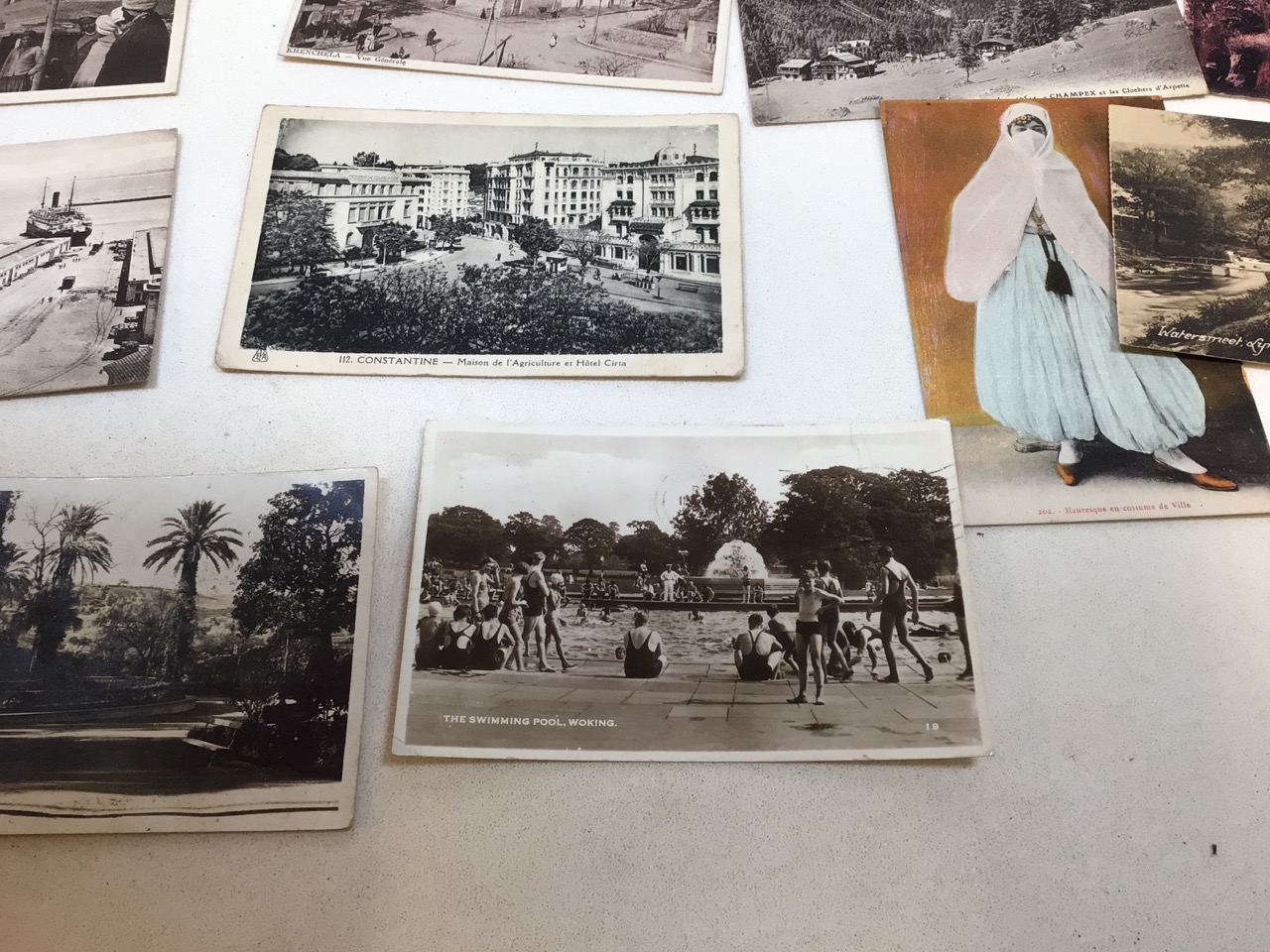 A quantity of cameras and accessories also with vintage postcard some early images of Algiers - Image 8 of 9