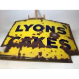 An original enamel sign for Lyons Cakes. A/F see photos for condition W:100cm x H:75cm