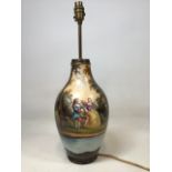 A hand painted lamp base of a pastoral scene W:18cm x H:51cm