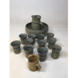 Stalham pottery - a quantity including a large bowl, jug and 11 beakers. Impressed stamp to