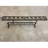 A section of decorative metal garden border panels also with a metal bracket shelf.
