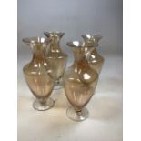 4 amber glass vases W:14cm x H:30cm
