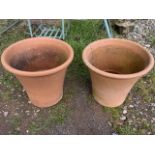 A pair of terracotta Yorkshire flower pots. H:39cm