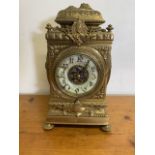 A large brass mantle clock. With enamel face (a.f). W:25cm x D:25cm x H:43cm
