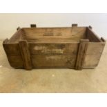 A large antique pine crate with rope side handles. W:100cm x D:53cm x H:38.5cm