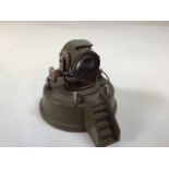 A toy Astra Die cast round base military search light lamp W:10cm x H:10cm