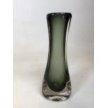 An imposing mid century smoked green glass vase W:16cm x H:40cm