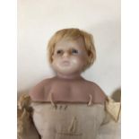 A Pierotti poured wax head doll thought to be in original clothes circa 1880. Owned by vendors