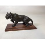 A spelter lioness on plinth W:26cm x H:14cm