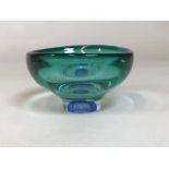 A green and blue Kosta Boda footed bowl by Goran Warff with original label. Circa 1990s Signed to