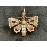 A gold 1920/ 30s Butterfly brooch pendent, un-hallmarked set opals, rubies, sapphires and