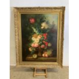 A very large floral oil on canvas signed L.Martin lower left. In good quality modern gilt frame. W: