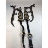 Shire horse brasses on straps together with a pair of horse Hanes