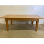 A modern oak extending table with two extras leaves. Unextended W:203cm x D:92cm x H:74cm