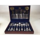 A Viners silver plated 58 piece cutlery set for 8 people in Traditional Bead design. Boxed.
