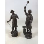 A pair of cast bronze style figures, a black smith and one other H:40cm Tallest figure