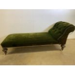 A Victorian button backed chaise lounge with bun feet and large ceramic castors. W:183cm x D:68cm