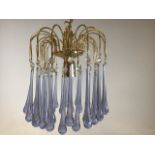A pair of Italian Murano style amethyst tear drop chandeliers circa 1960 with two tiers of