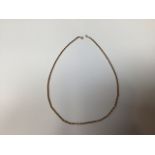 A 9 carat gold chain - 44cm length