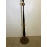 A black and gilt painted standard lamp with moulded decorative gilt base. H:155cm
