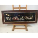 A late 19th early 20th century hand stitched embroidery in oak frame.