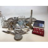 Silver handled cutlery - 3 items also with an early twentieth century condiment set on stand,
