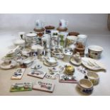 A large quantity of Toni Raymond pottery includes storage jars, eggcups, pots, door plaques and 2