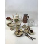 A quantity of Motto ware including a coffee jug and egg cups with other items