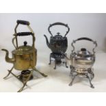 3 spirit kettles, 2 silver plate and 1 brass