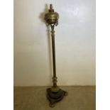 A Brass and metal heavy standard oil lamp. Max height H:210cm