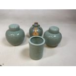 A group of celadon items including 2 lined ginger jars, A brush holder and a wine jar. Height of