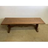A rectangular oak coffee table. W:139cm x D:42cm x H:41cm