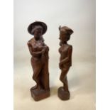 Carved wooden figurines of Eastern Women . Damage to headdress of one (see photo) H:64cm Height of