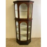 An early 20th century mahogany octagonal three piece glazed display cabinet. W:64cm x D:37cm x H: