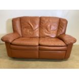 A leather two seater sofa, one side with recliner. W:154cm x D:90cm x H:90cm