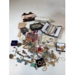 A collection of costume jewellery including vintage brooches and others