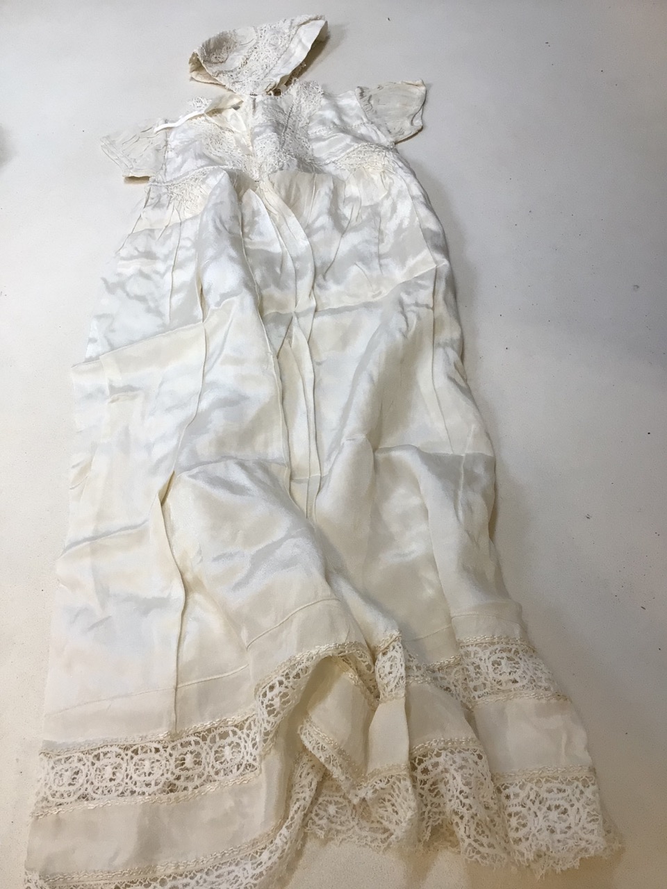 A Victorian christening gown and bonnet, vintage embroidered cushion and other items, tin of - Image 2 of 10