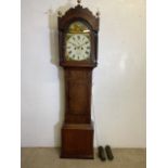 A Victorian mahogany longcase clock with makers name Peach Bridport. Brass finials to top, hand