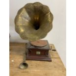 His master voice gramophone with brass horn.