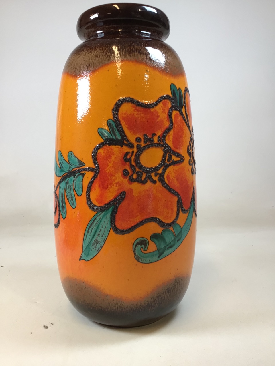 West German Fat Lava pottery floor vase model 284-53. Bright orange ground with orange and red