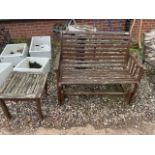 An unusual swinging garden bench also with a square table. W:113cm x D:52cm x H:90cm