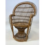 A miniature wicker apprentice chair. H:43cm
