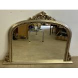 A decorative silvered overmantle mantle mirror. W:127cm x H:92cm