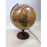 A light up globe - World Discoverer scan globe W:30cm x H:42cm