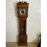 A Modern reproduction grandmother clock with weights and pendulum. H:162cm