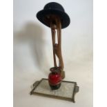 A West German vase, Christies bowler hat, tray and a wooden carving.